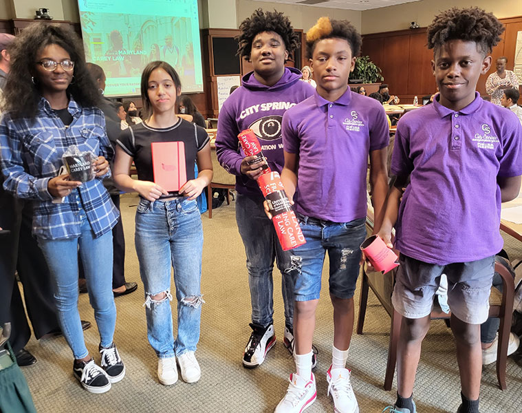 Winning group of students of color from a session on peer informed mediation