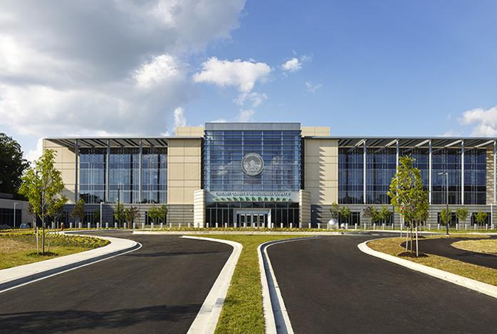 Building with large glass windows on a sunny day